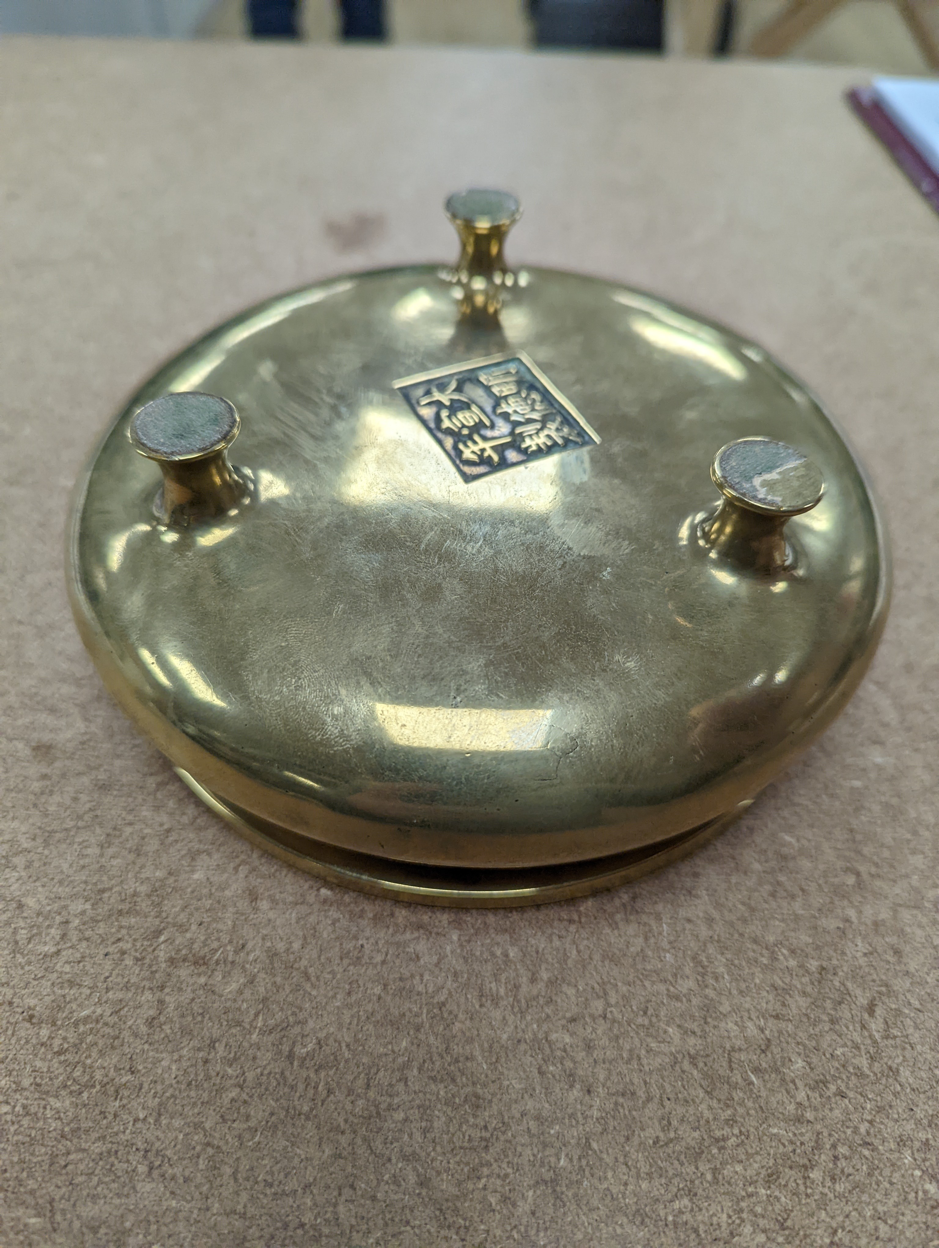 A Chinese bronze censer, ding, Xuande mark, 18th / 19th century, diameter 16.6cm, height 6.7cm